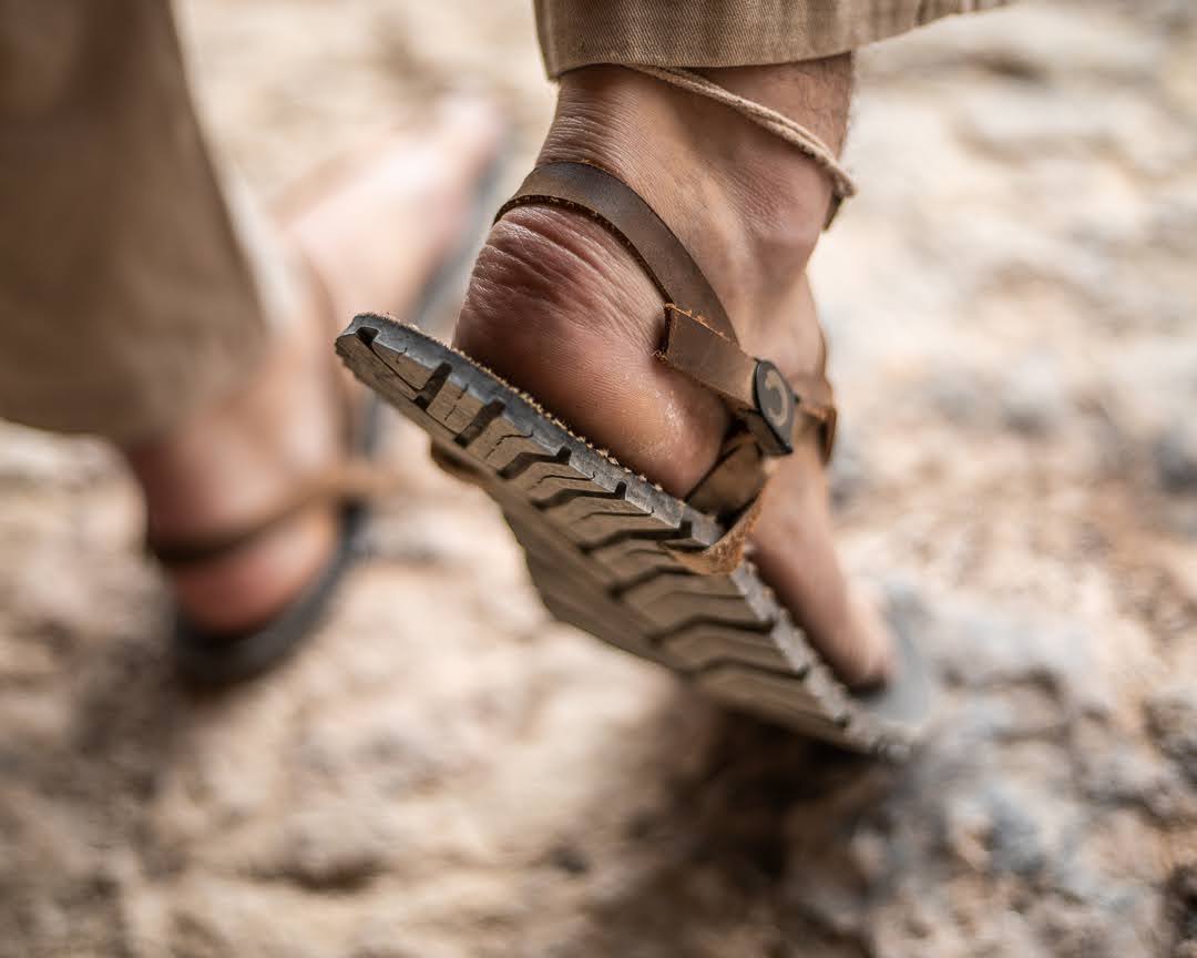 Natural leather straps - outdoor closeup in desert